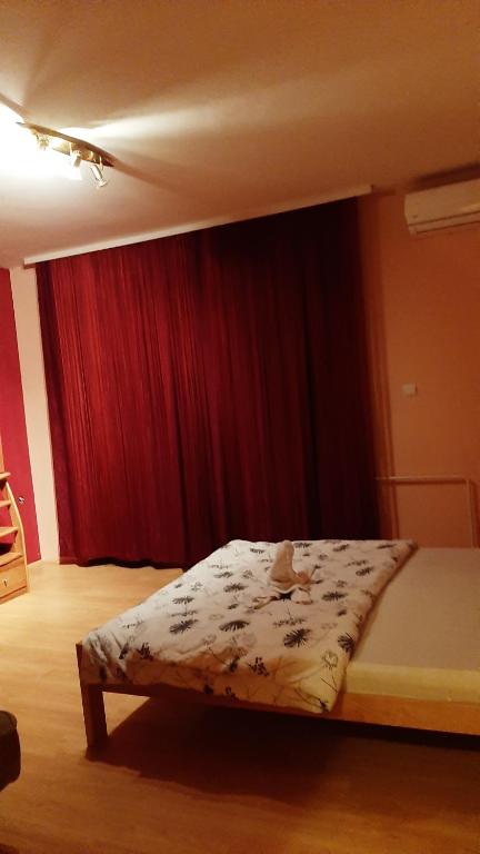 Postel nebo postele na pokoji v ubytování Apartmani Vesna