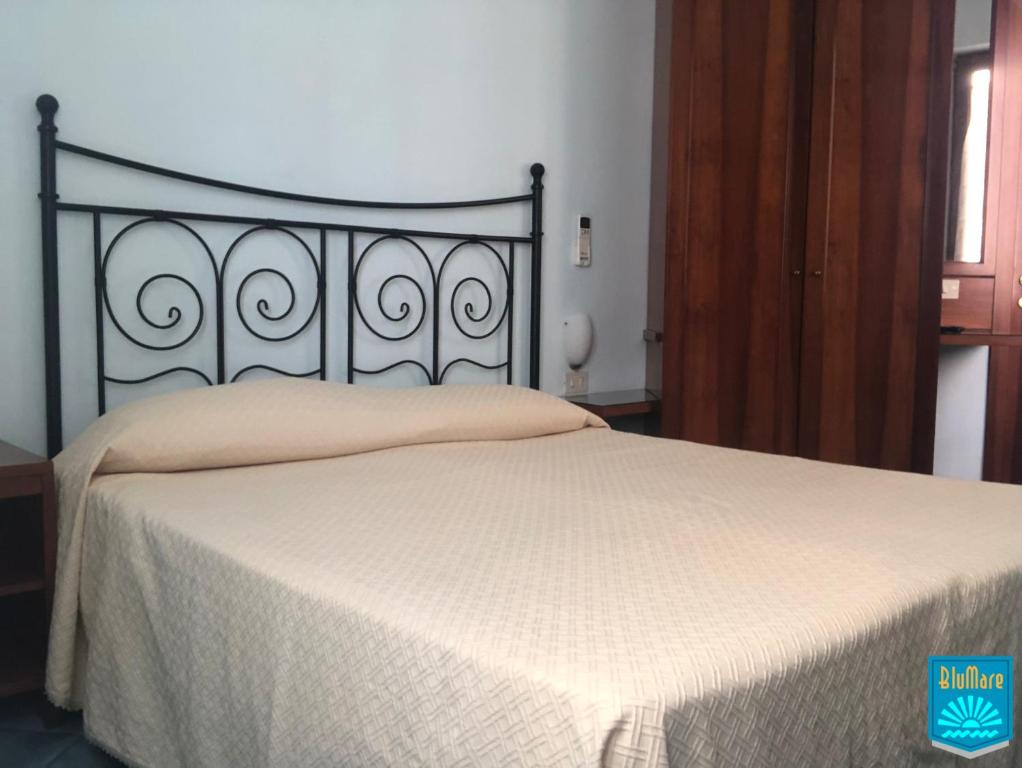 Postel nebo postele na pokoji v ubytování Blu Mare