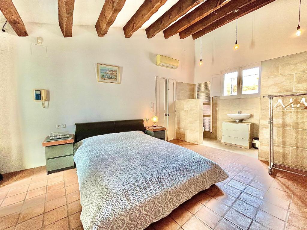 Posteľ alebo postele v izbe v ubytovaní Casa Joan Badosa Roses - Immo Barneda