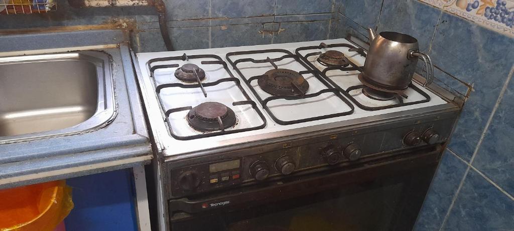 Kuchyň nebo kuchyňský kout v ubytování غرفة سنجل بحمام خاص لمزيد من الخصوصية Single Room with private bathroom for more privacy Номер с отдельной ванной комнатой для большей конфиденциальности Chambre avec salle de bain privée pour plus d'intimité