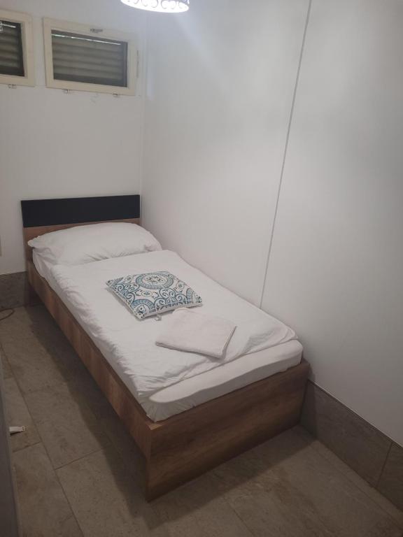 Posteľ alebo postele v izbe v ubytovaní Ambiente