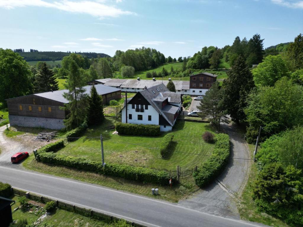 an aerial view of a house and a road at Hamříkova stáj in Dolní Moravice