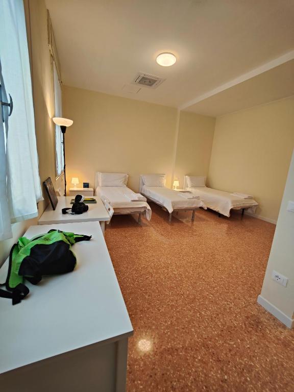 Postel nebo postele na pokoji v ubytování Casa dello Studente