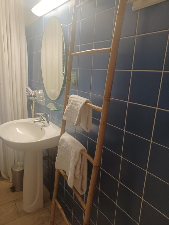Koupelna v ubytování Hôtel La Parenthèse