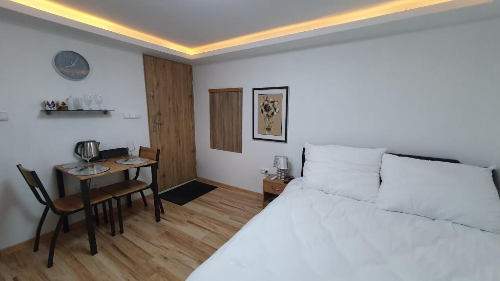 Postel nebo postele na pokoji v ubytování DAVID HOME 56