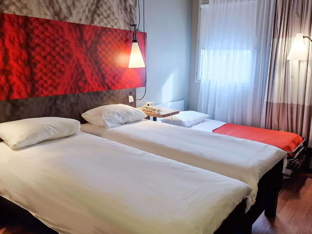 Postel nebo postele na pokoji v ubytování Hotel ibis Dijon Centre Clemenceau
