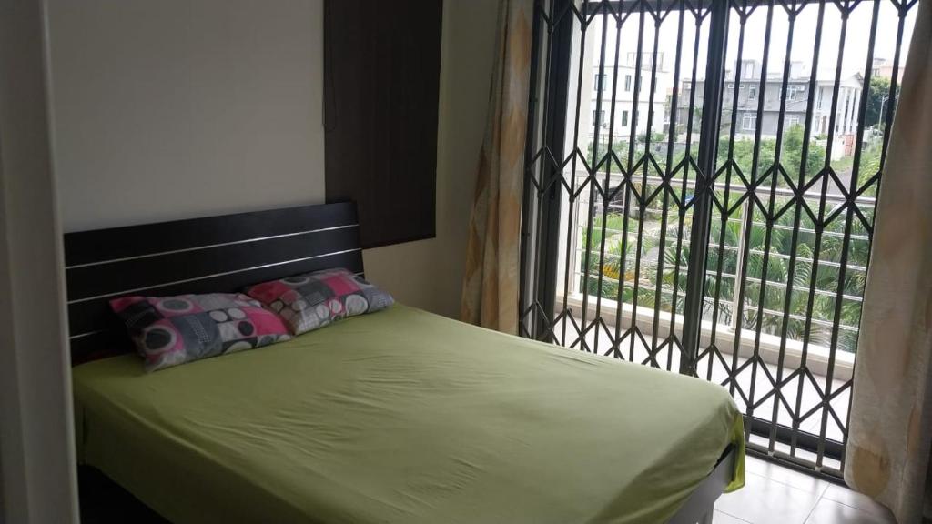 Ένα ή περισσότερα κρεβάτια σε δωμάτιο στο Villa John