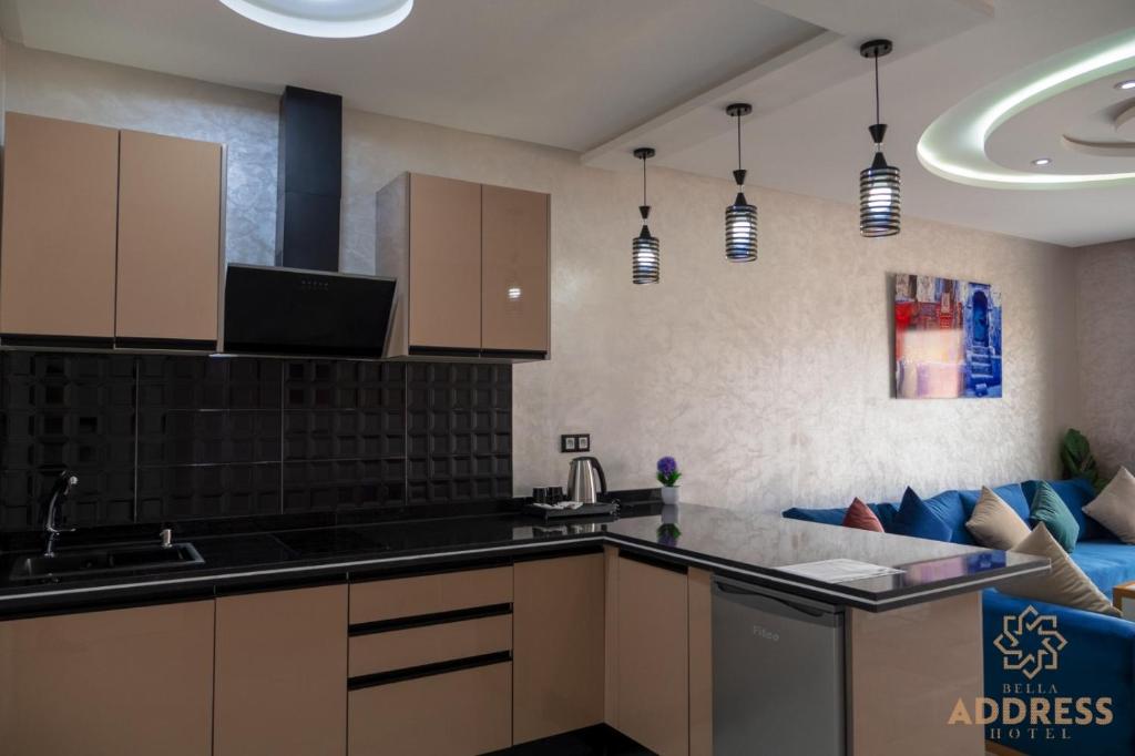 Кухня или мини-кухня в Bella Address Hotel Beach
