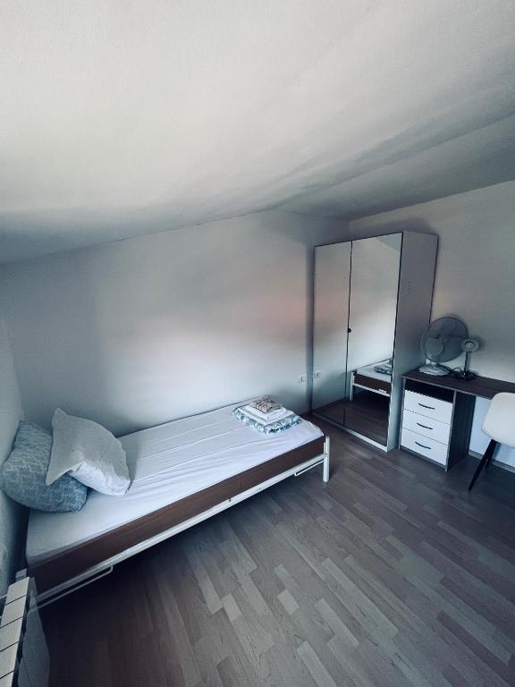 Postel nebo postele na pokoji v ubytování Rooms Busija