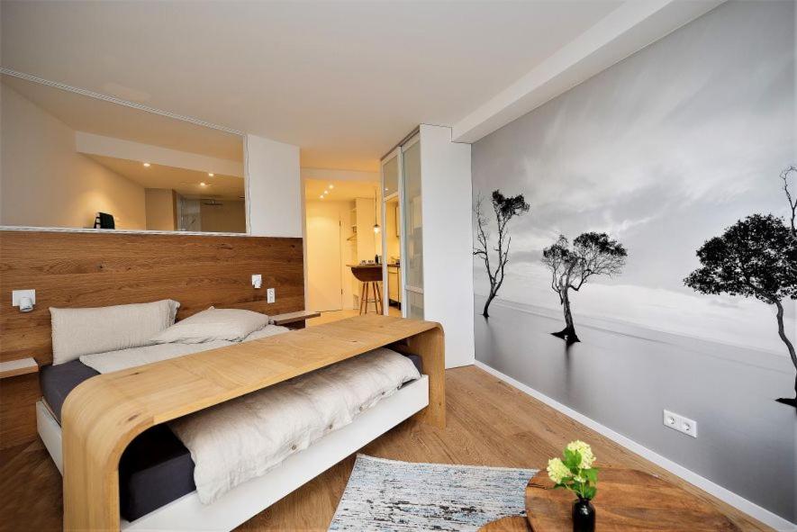 Postel nebo postele na pokoji v ubytování ArtRoom Boarding Apartment
