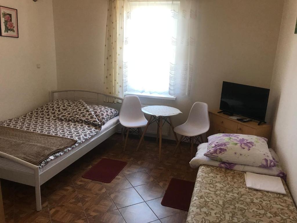 TV a/nebo společenská místnost v ubytování Dom Jana