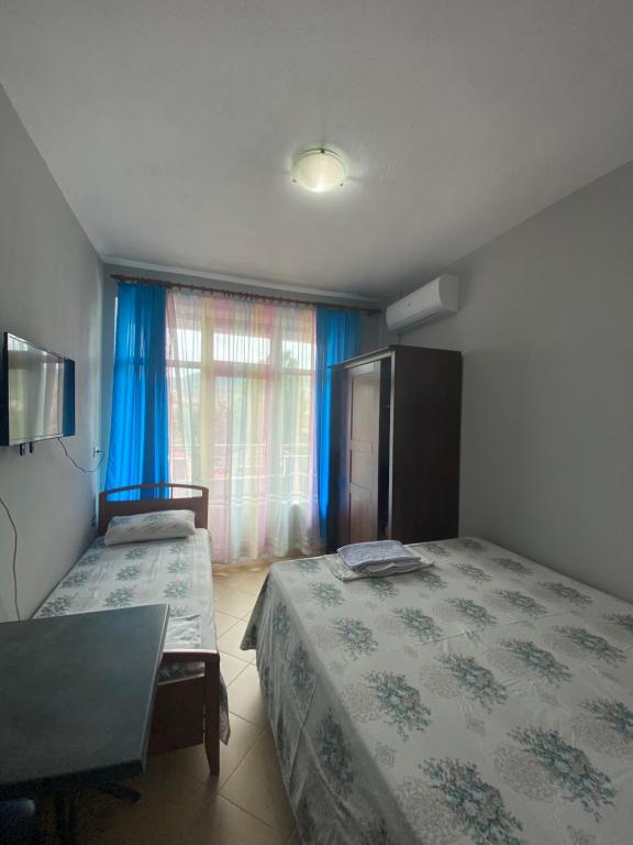 Postel nebo postele na pokoji v ubytování Vila Vadeha