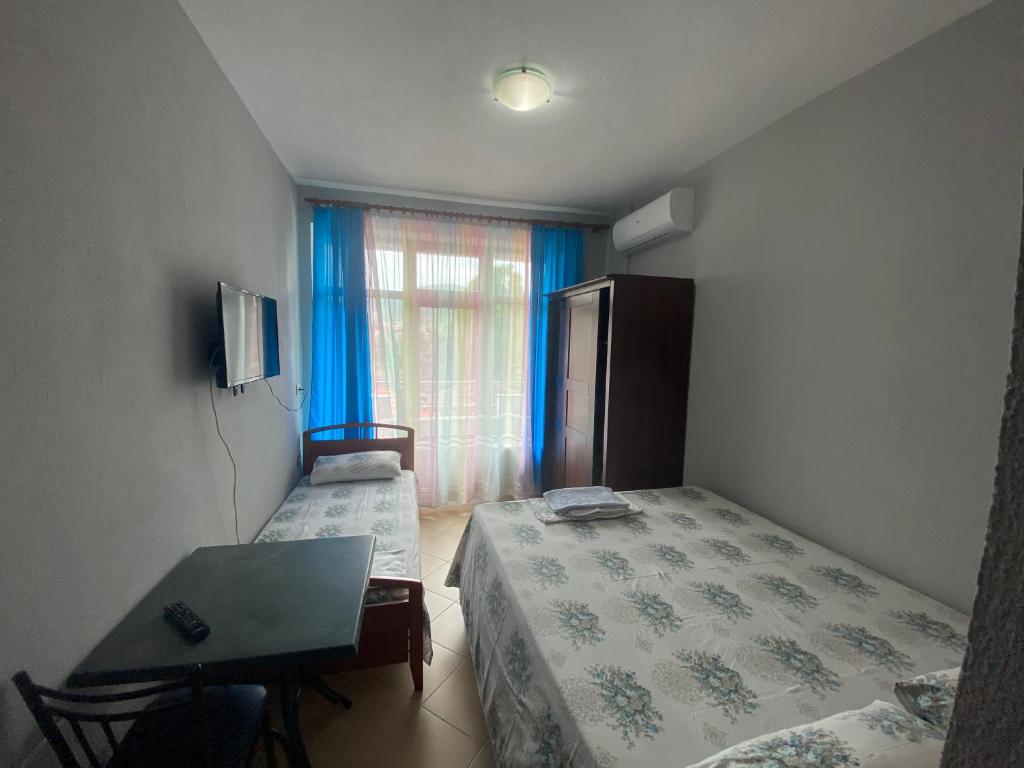 Postel nebo postele na pokoji v ubytování Vila Vadeha