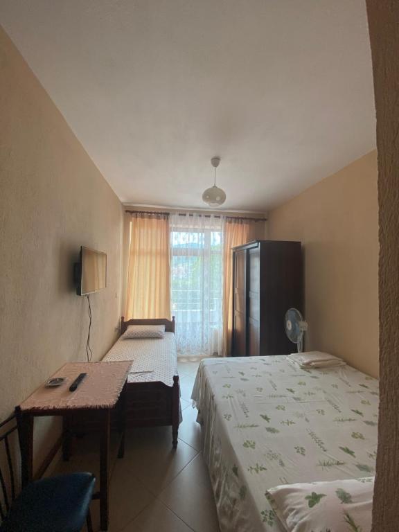 Postel nebo postele na pokoji v ubytování Vila Vadeha