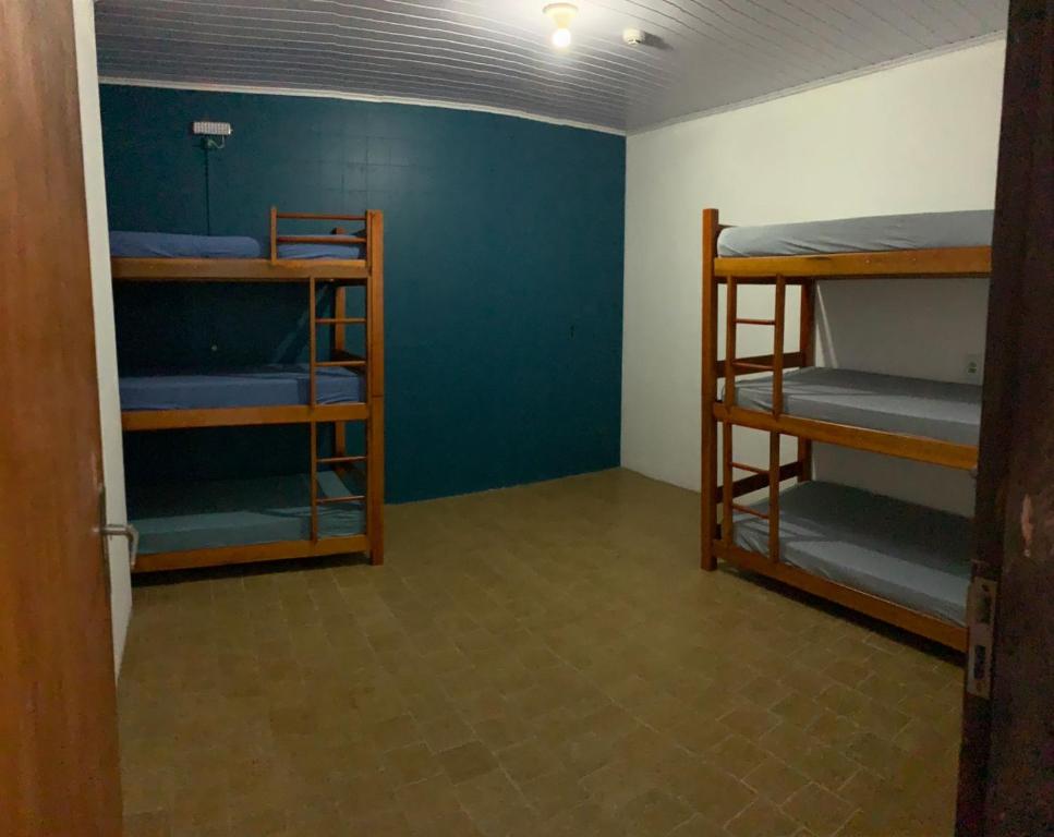 Postel nebo postele na pokoji v ubytování HOSTEL PACÍFICO