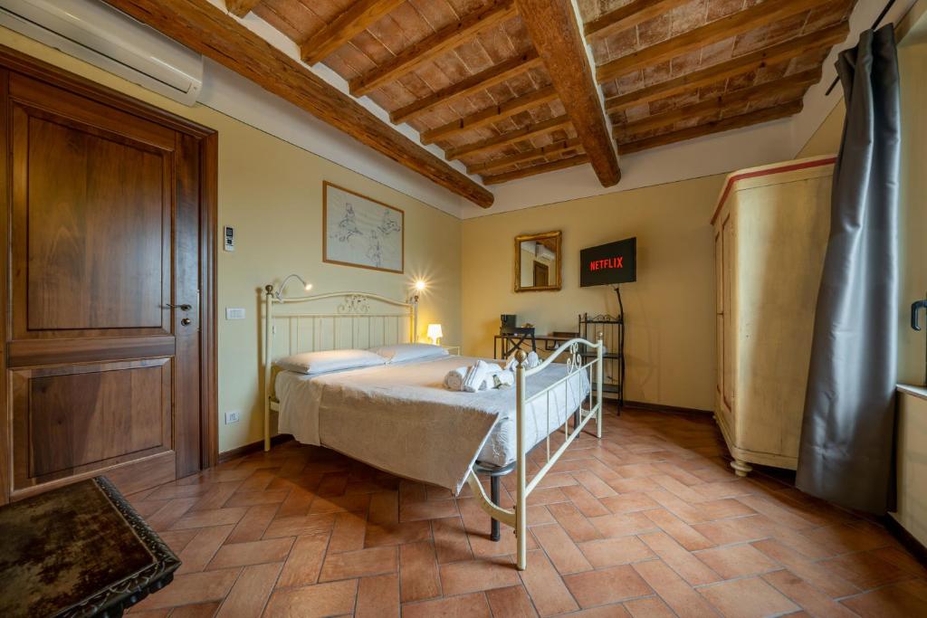 Postel nebo postele na pokoji v ubytování Casello A1, Modena sud - Villa Aurora Charming Rooms