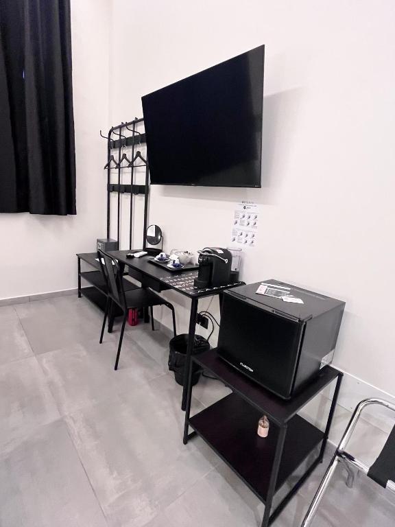 TV a/nebo společenská místnost v ubytování BeTurin