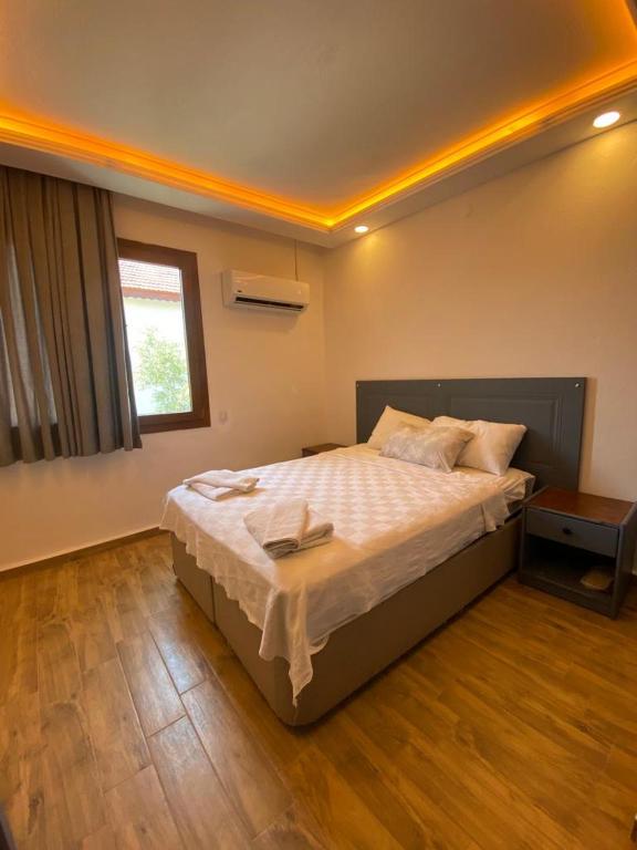 Postel nebo postele na pokoji v ubytování Kilim Hotel & Apart