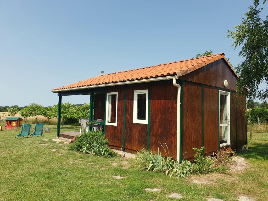 Zahrada ubytování Les Chalets du Quignon