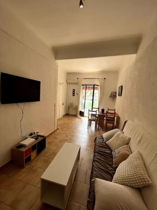 a living room with a couch and a table at Le Pêcheur in Cassis