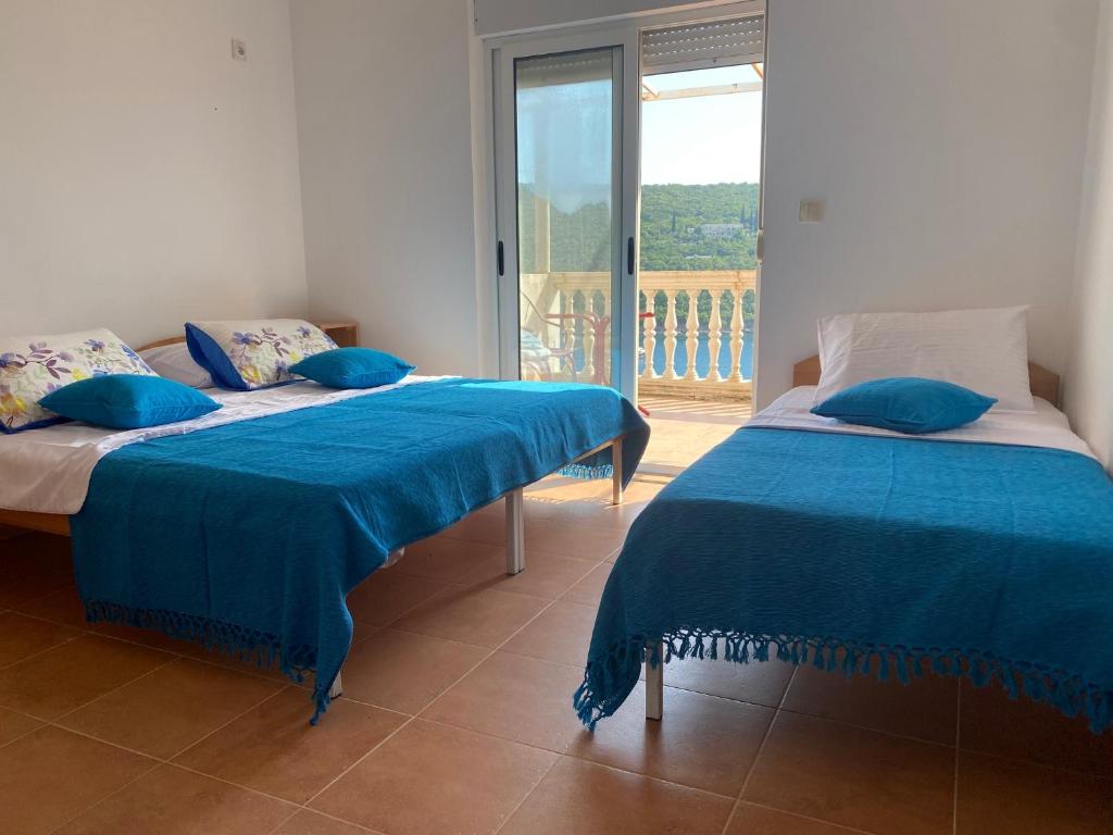 Voodi või voodid majutusasutuse Mare Apartments toas