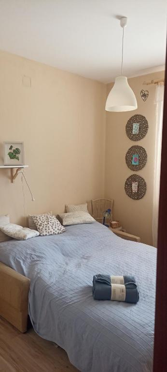 Posteľ alebo postele v izbe v ubytovaní Barackvirág Apartmanház
