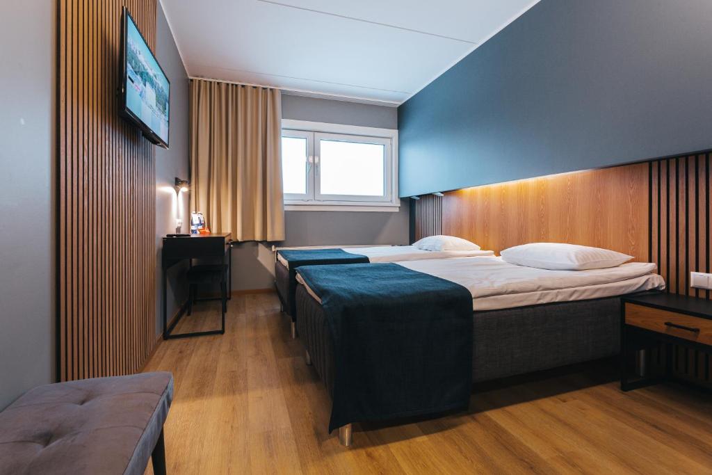 Voodi või voodid majutusasutuse Go Hotel Shnelli toas