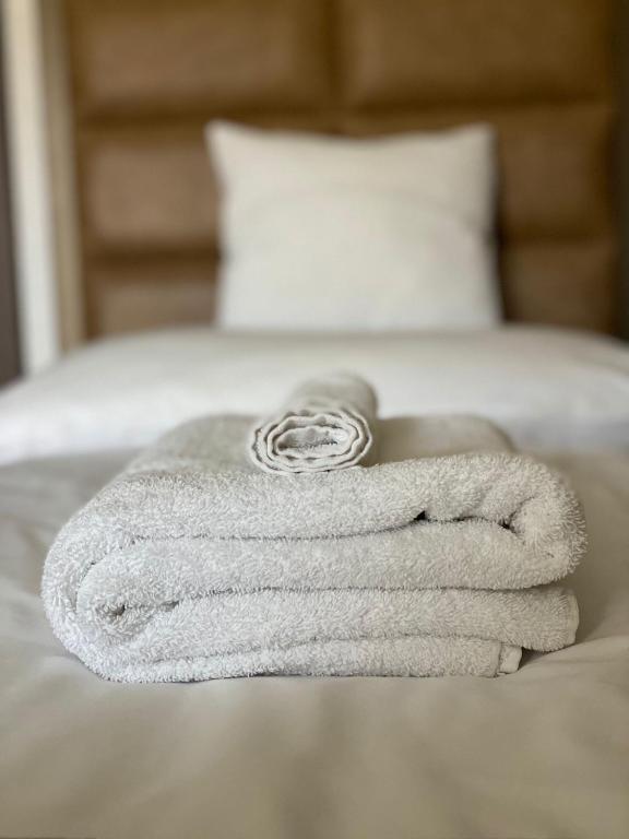 Postel nebo postele na pokoji v ubytování Blueline Motel