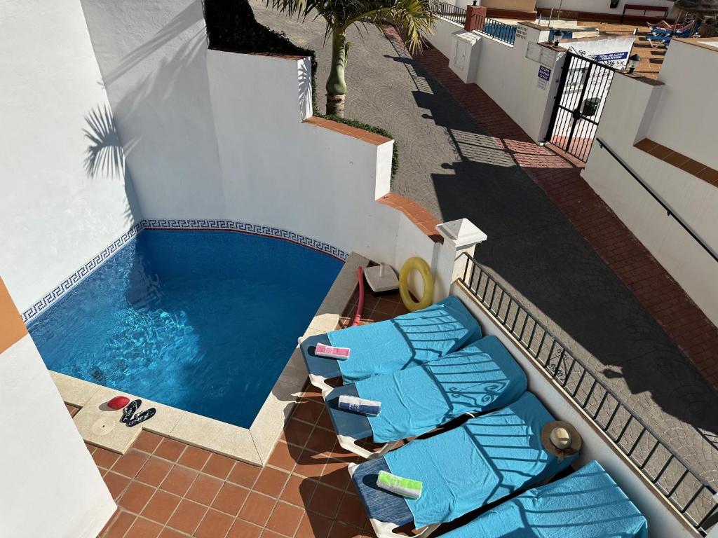 Bazén v ubytování Spacious family villa Aljamar 8a nebo v jeho okolí