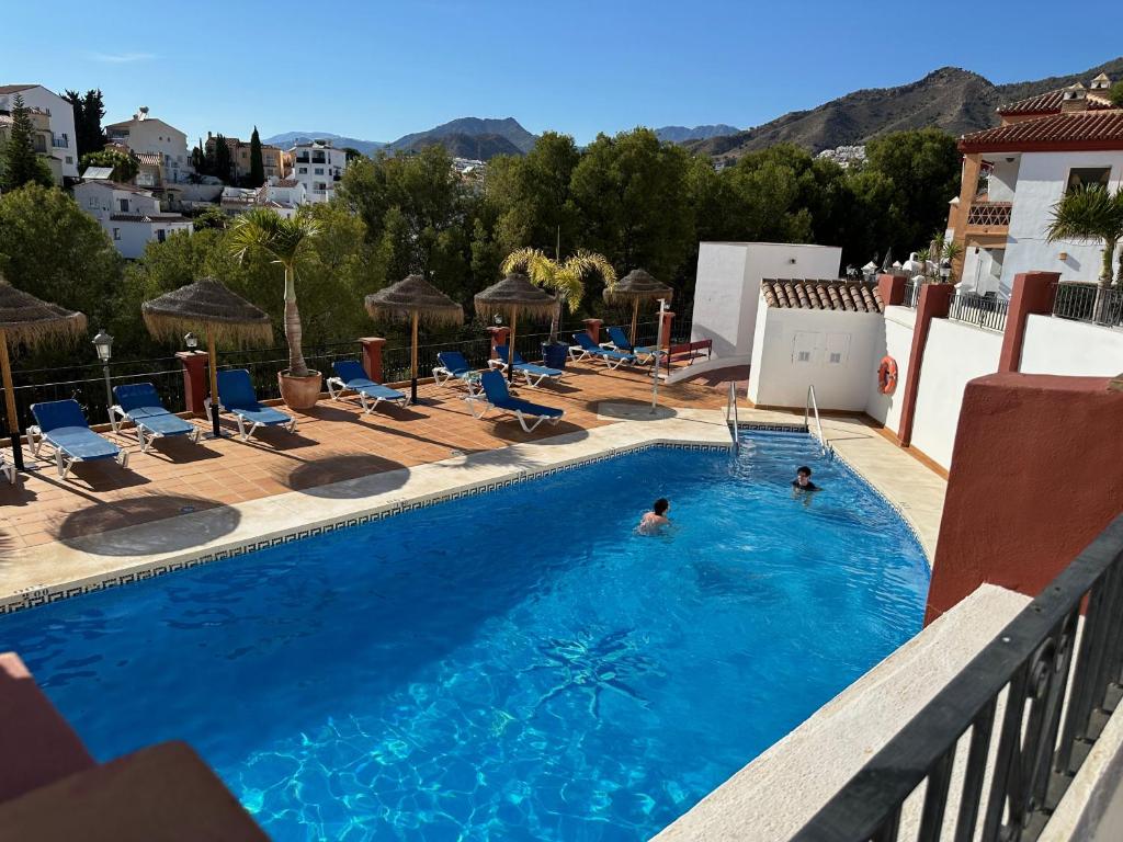 Bazén v ubytování Spacious family villa Aljamar 8a nebo v jeho okolí