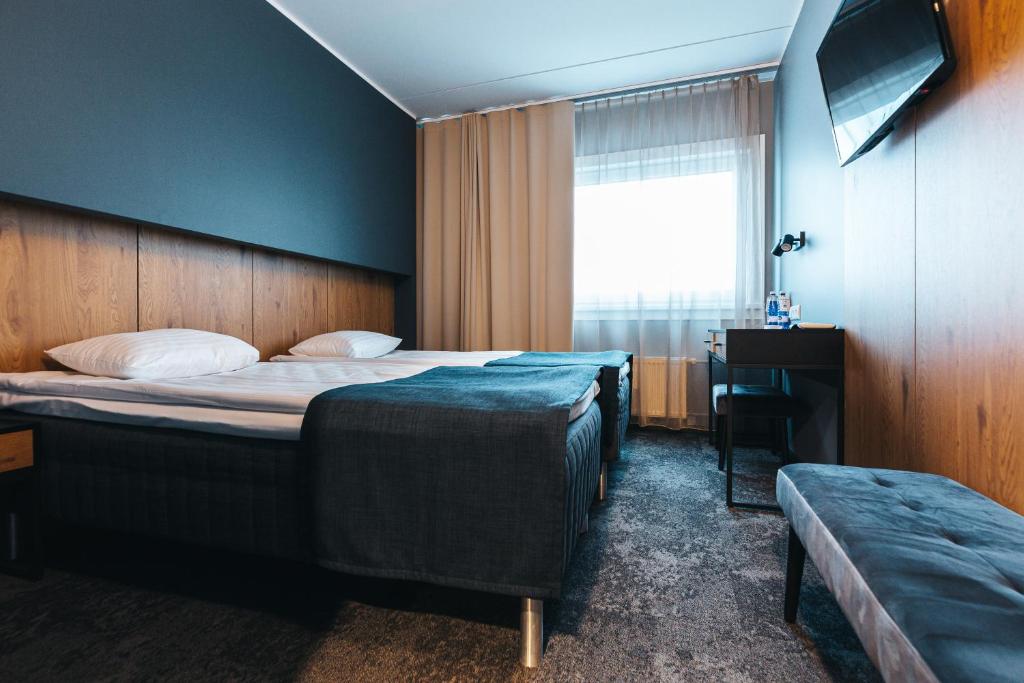 Postel nebo postele na pokoji v ubytování Go Hotel Shnelli