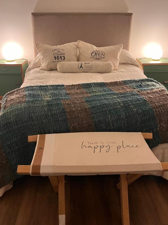 Postel nebo postele na pokoji v ubytování Oeste suites