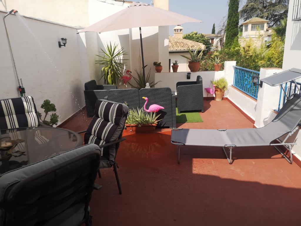 A seating area at Casa el "Tablao de las Almendras"