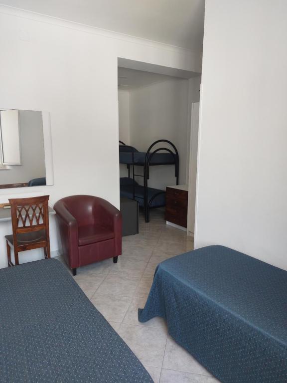 Postel nebo postele na pokoji v ubytování Hotel Klein Wien