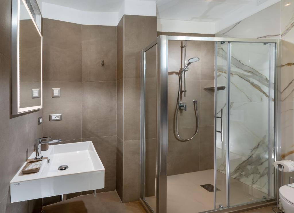 Koupelna v ubytování Hotel International direttamente sulla Sabbia