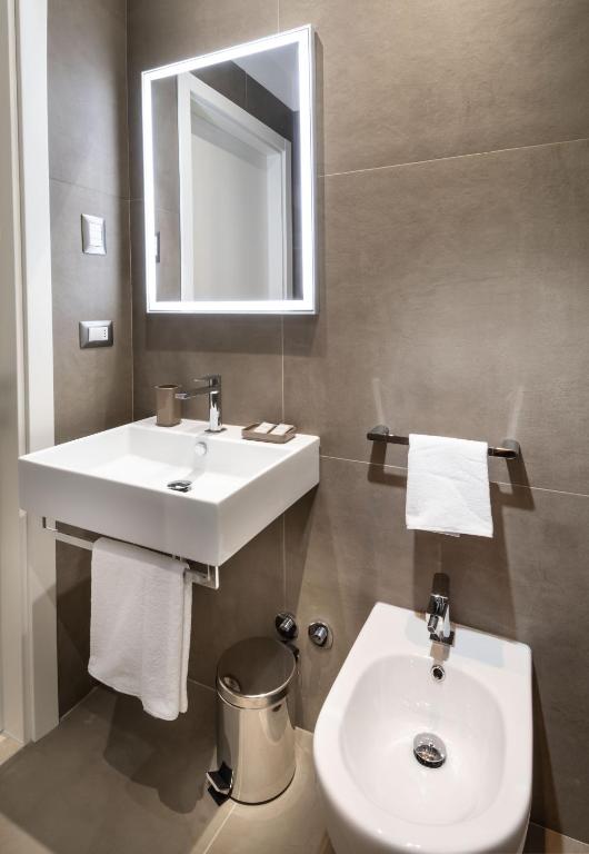 Koupelna v ubytování Hotel International direttamente sulla Sabbia
