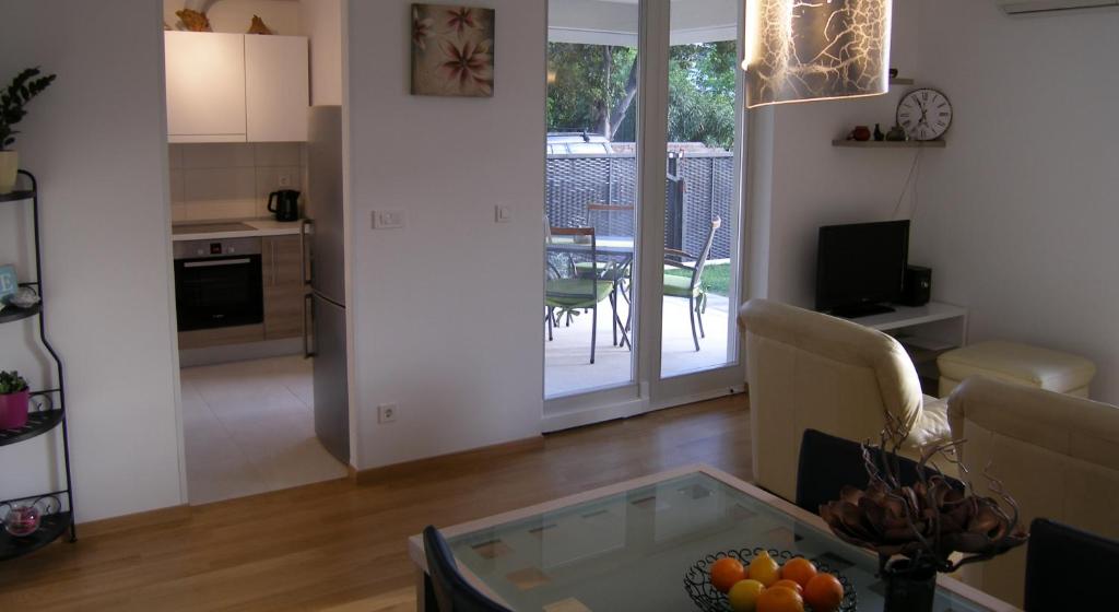 Kuchyňa alebo kuchynka v ubytovaní Momentum Apartment