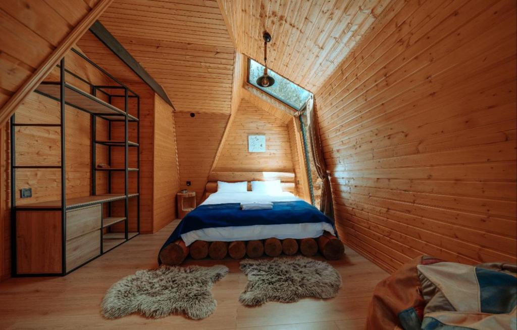 Postel nebo postele na pokoji v ubytování Cottage Galileo in Abastumani