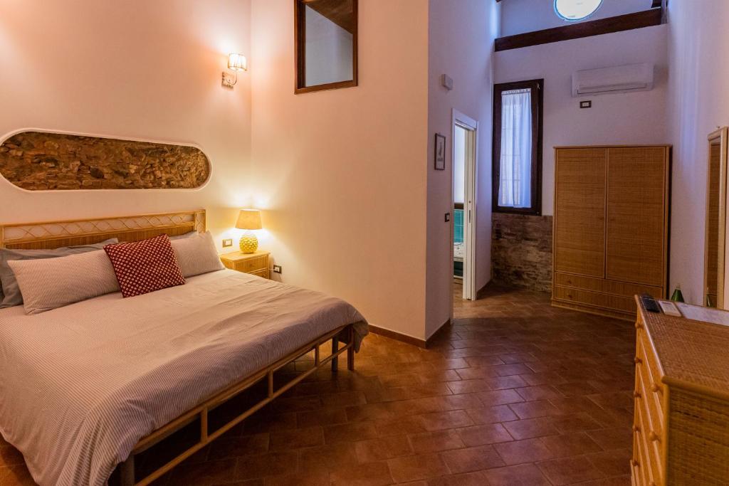 Postel nebo postele na pokoji v ubytování Cantine Cipri Resort