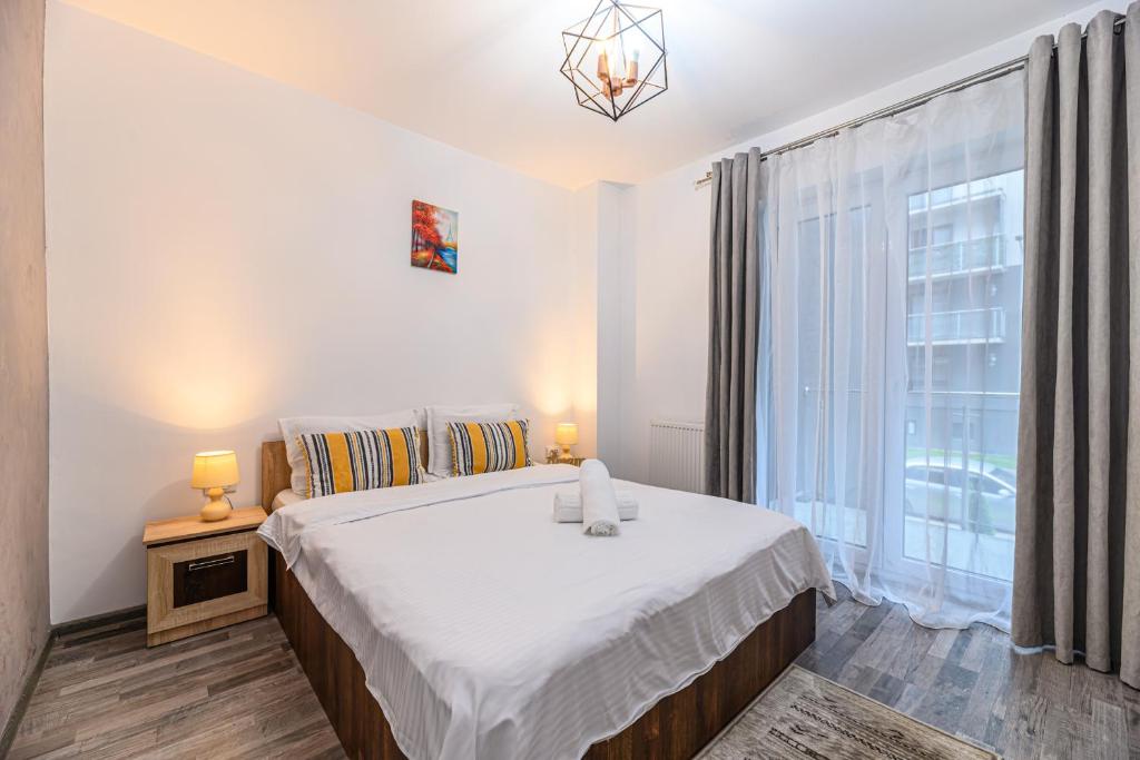 Katil atau katil-katil dalam bilik di JAD - Comfortable - Apartments - Coresi