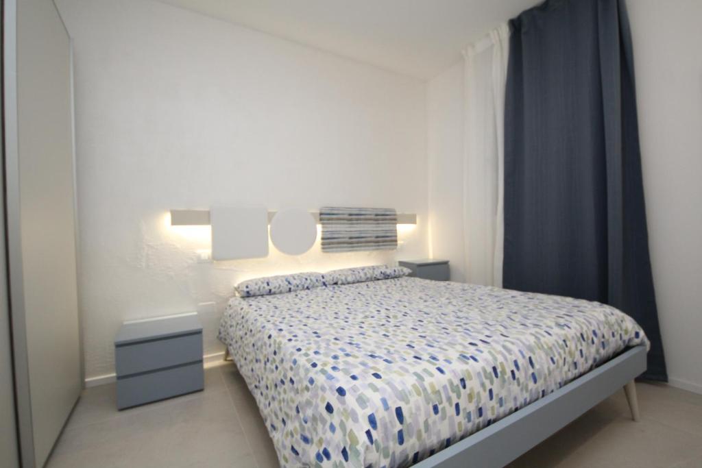 Postel nebo postele na pokoji v ubytování Ca' Del Mare
