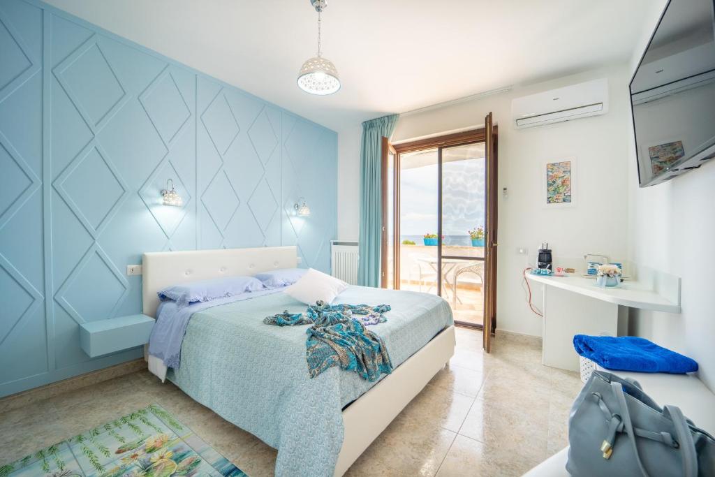 Postel nebo postele na pokoji v ubytování Almaré B&B