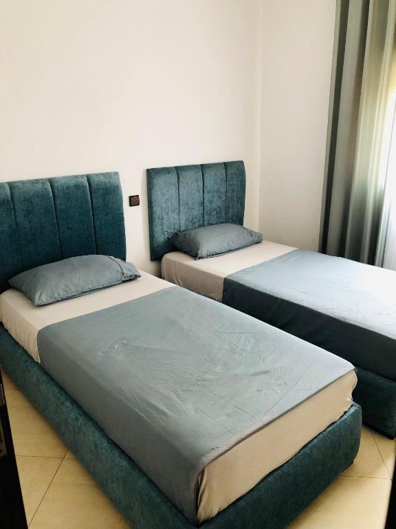 Postel nebo postele na pokoji v ubytování Appartement Charmant