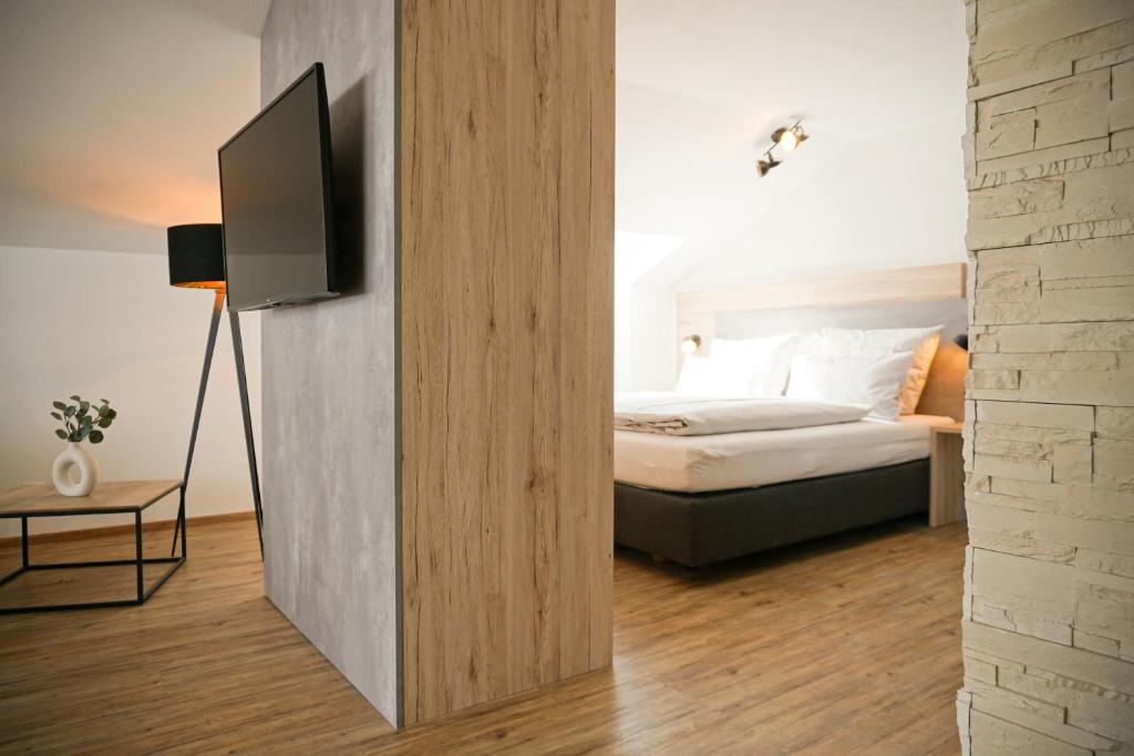 Postel nebo postele na pokoji v ubytování Hotel verWeiler