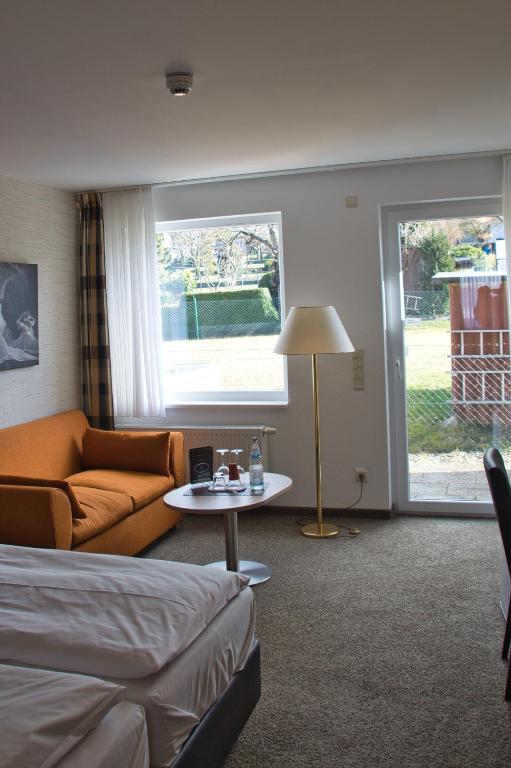 Postel nebo postele na pokoji v ubytování Hotel Quellenhof