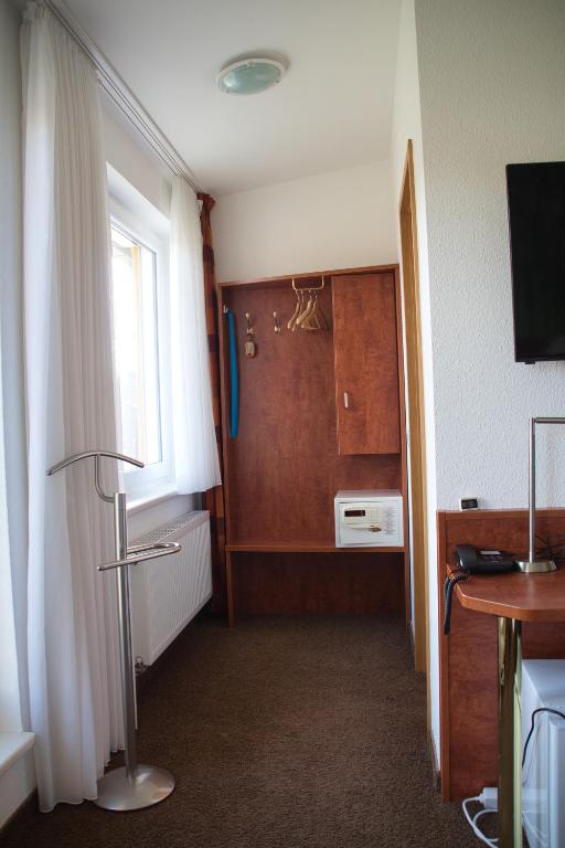 Kuchyň nebo kuchyňský kout v ubytování Hotel Quellenhof