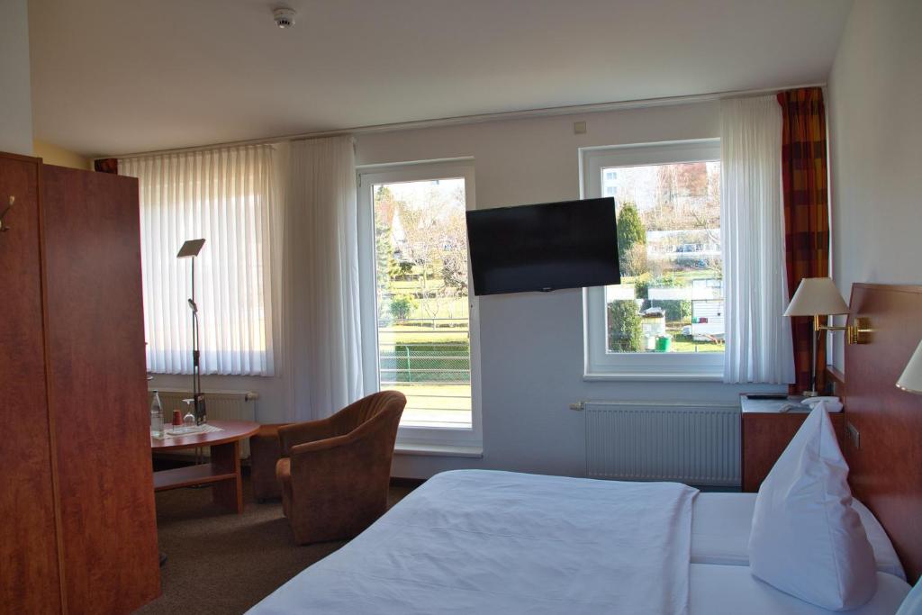 TV a/nebo společenská místnost v ubytování Hotel Quellenhof