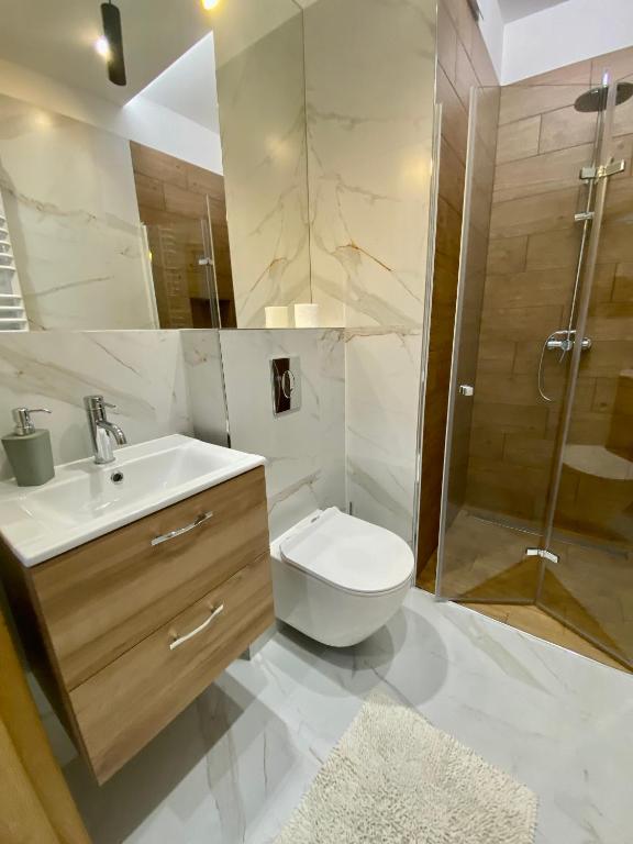 Koupelna v ubytování Apartamenty Białe nad jeziorem Białym