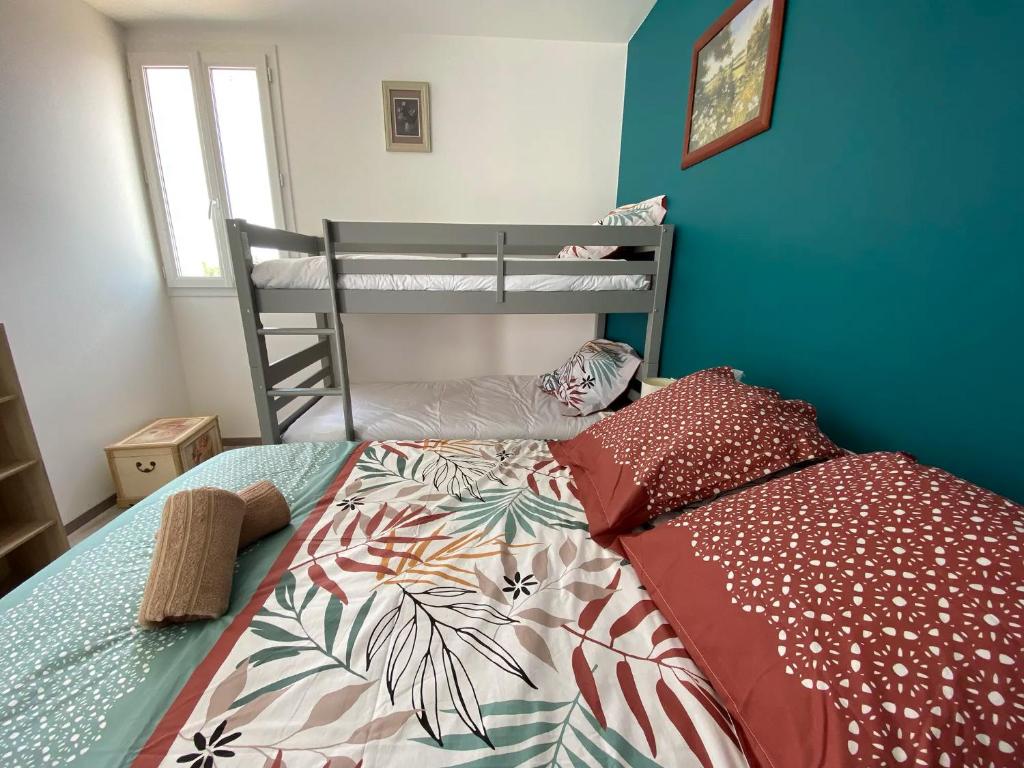 Postel nebo postele na pokoji v ubytování Auberge des Plaines - Appart'hôtel