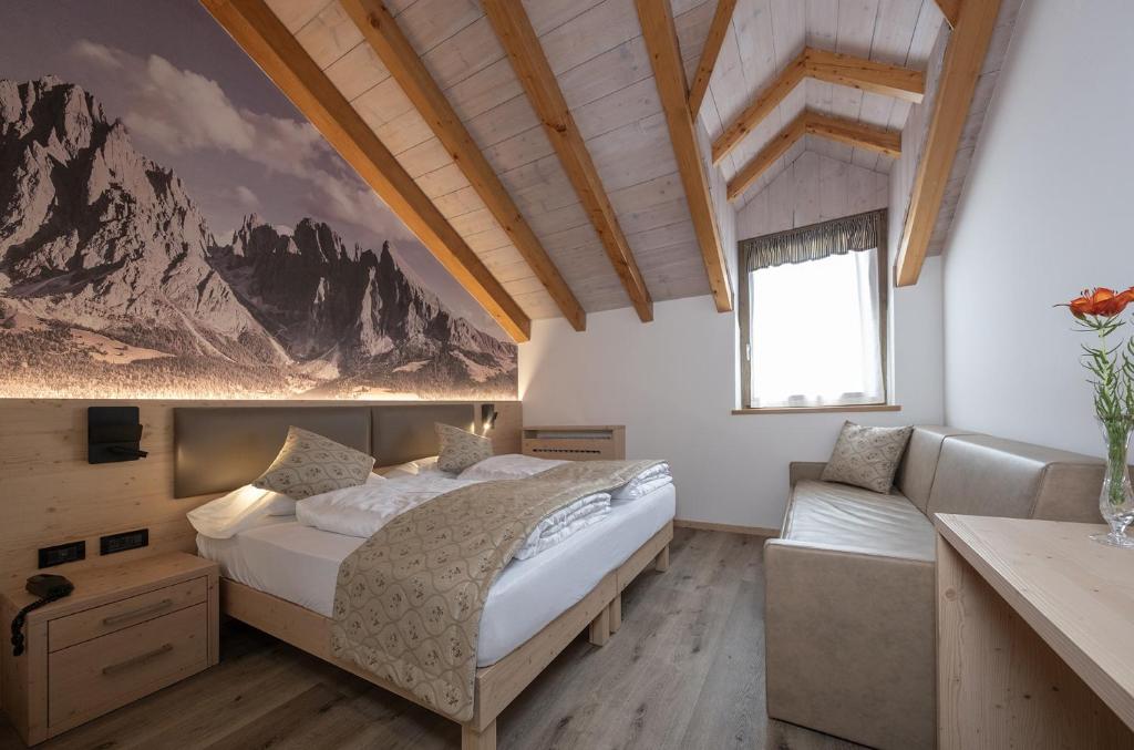 Postel nebo postele na pokoji v ubytování Hotel Canada